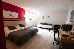 Junior Suite, Garden Area | In-room safe, desk, laptop workspace, iron/ironing board