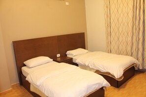 Suite, 1 Bedroom | Egyptian cotton sheets, pillowtop beds, in-room safe, rollaway beds