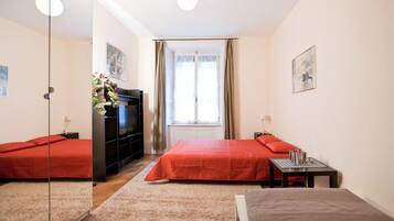 Standard Apartment, Kitchen | Desk, iron/ironing board, cots/infant beds, rollaway beds