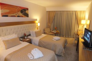 Habitación individual | Minibar, caja de seguridad en la habitación, escritorio y wifi gratis 