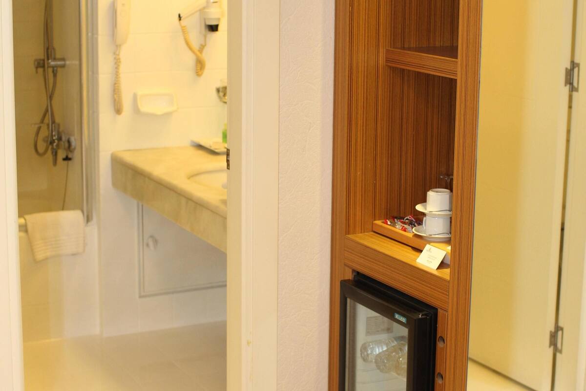 hair dryer, slippers, towels