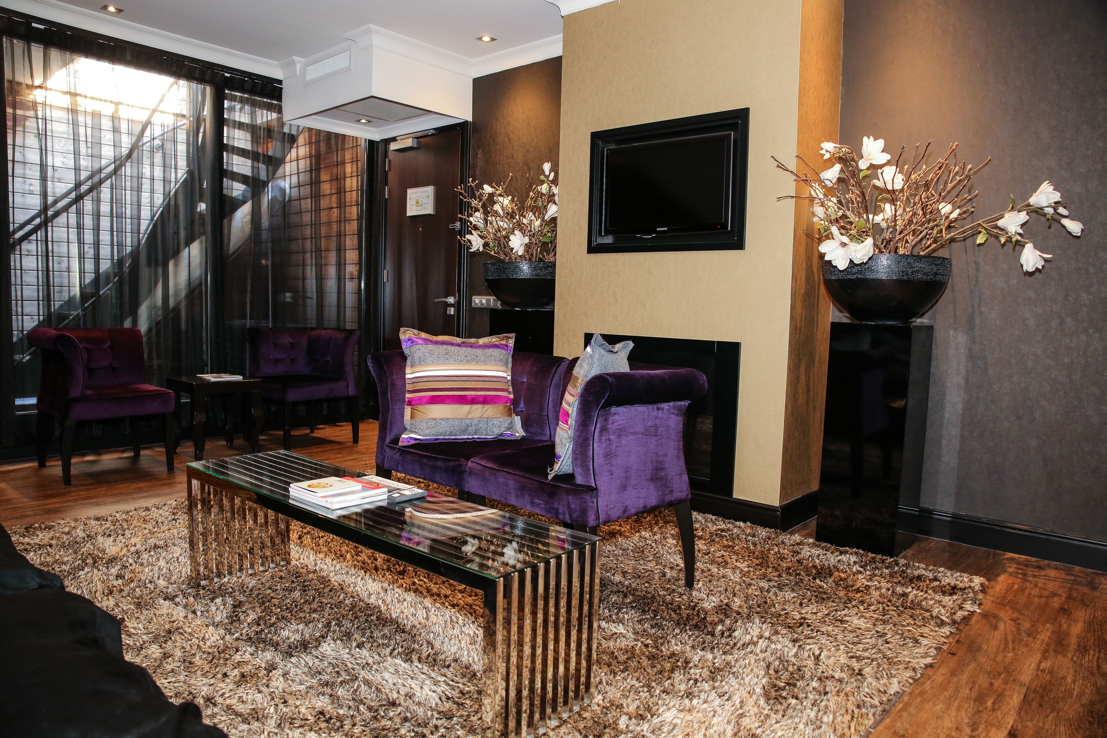 presidential suite, 1 bedroom | living room | 26-inch smart tv with satellite channels, tv, netflix