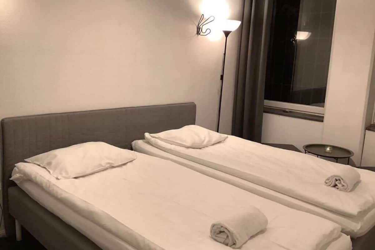 Private twin room, shared amenities | Free WiFi, bed sheets