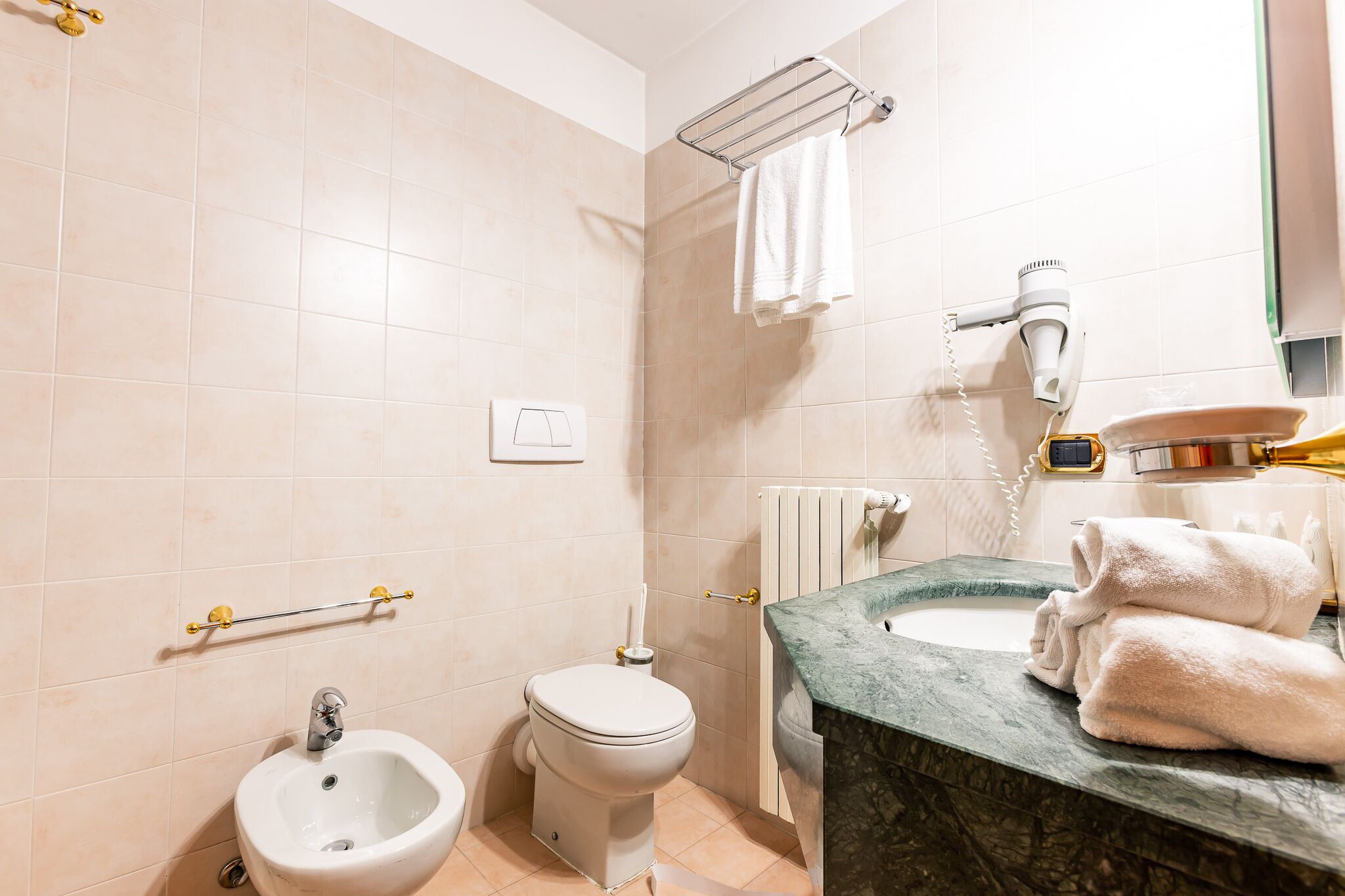 free toiletries, hair dryer, slippers, towels