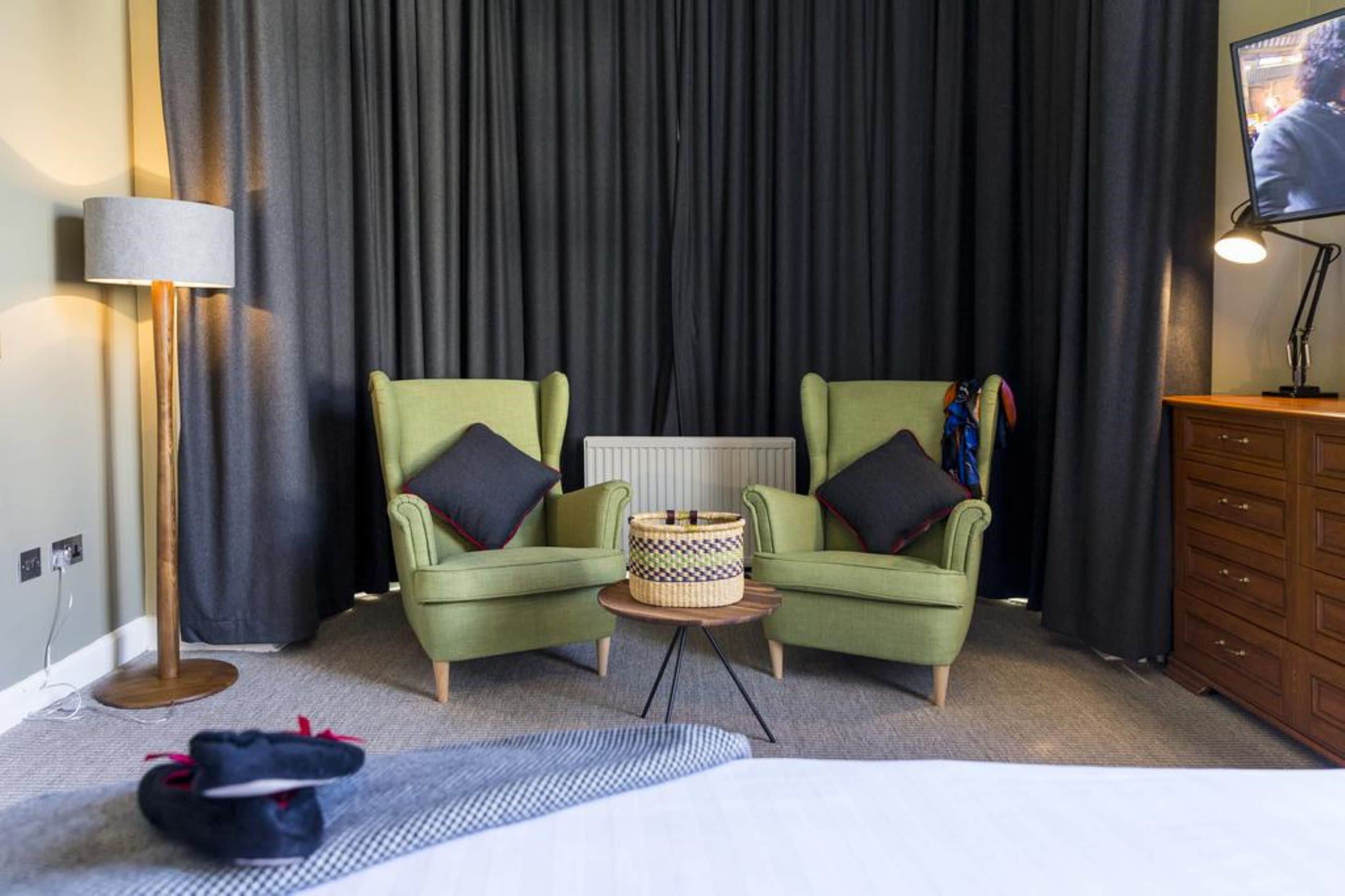 executive double or twin room | living area | flat-screen tv