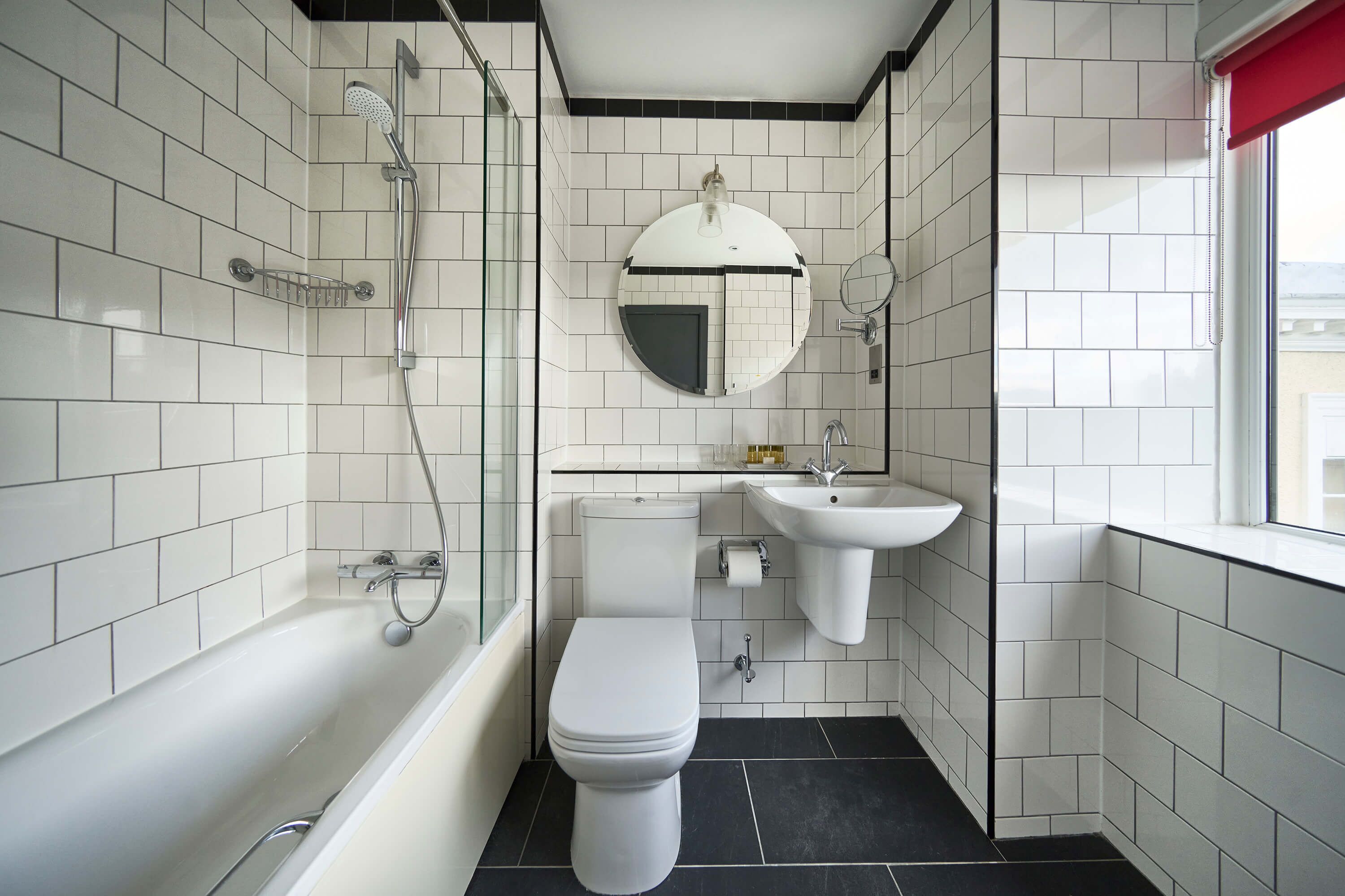 family room | bathroom | eco-friendly toiletries, hair dryer, towels, shampoo