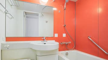 Combined shower/tub, free toiletries, hair dryer, slippers