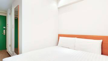 Down comforters, desk, laptop workspace, blackout drapes