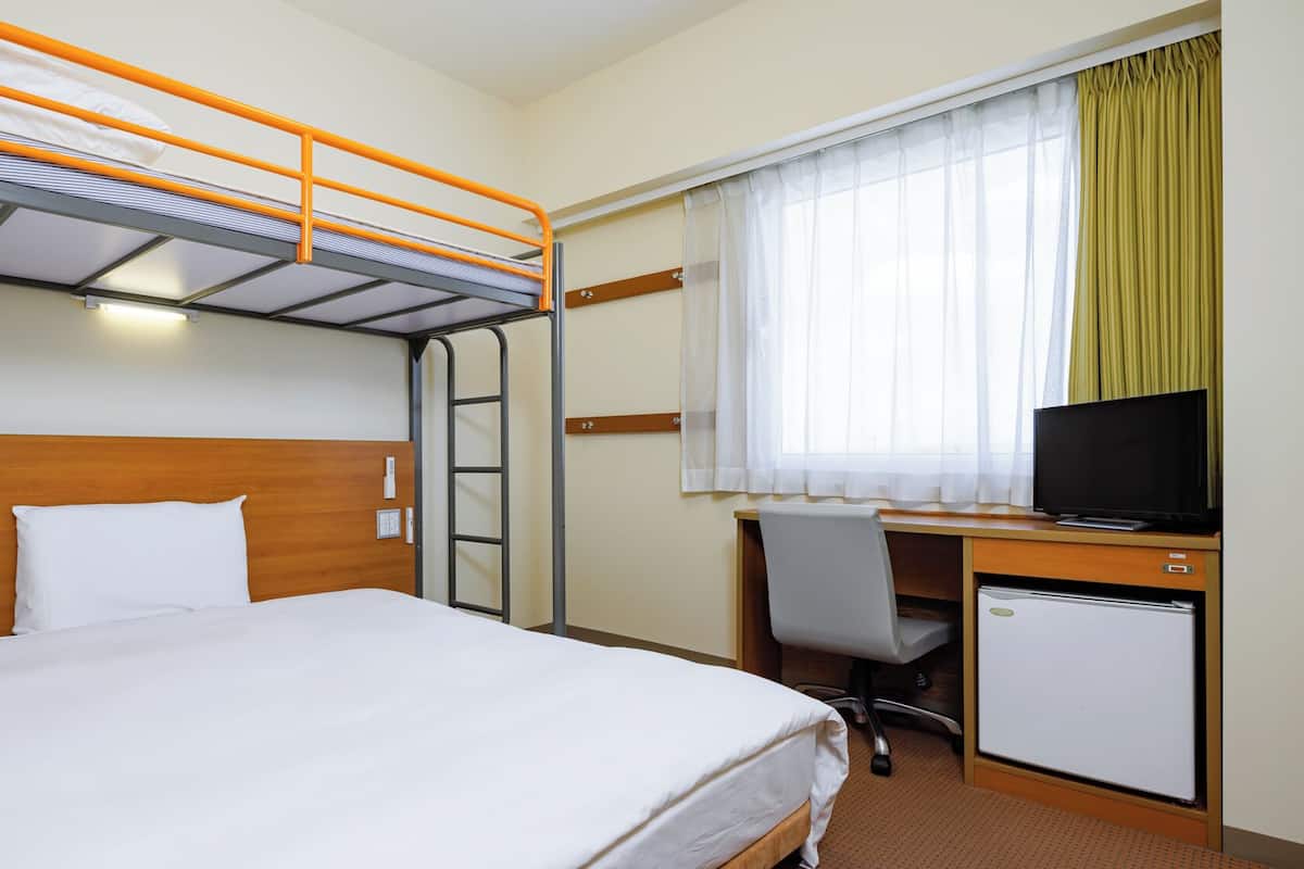 Down duvets, desk, laptop workspace, blackout curtains