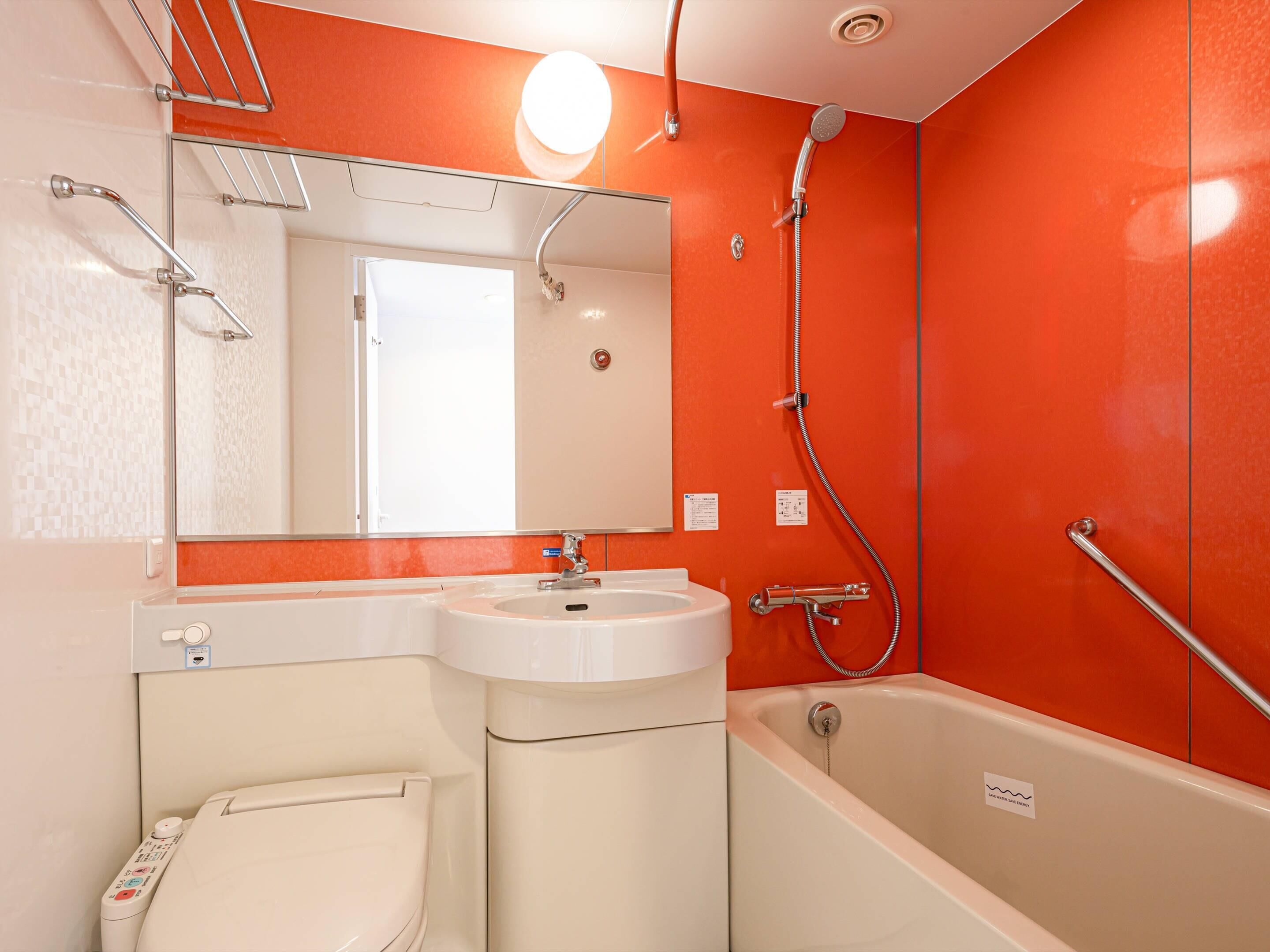 Combined shower/tub, free toiletries, hair dryer, slippers