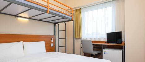 Down duvets, desk, laptop workspace, blackout curtains