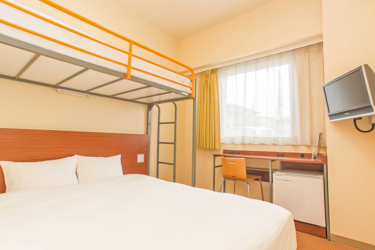 Down comforters, desk, WiFi (free), bed sheets