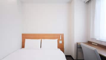 Down duvets, desk, laptop workspace, blackout curtains