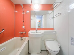 Combined shower/tub, free toiletries, hair dryer, slippers