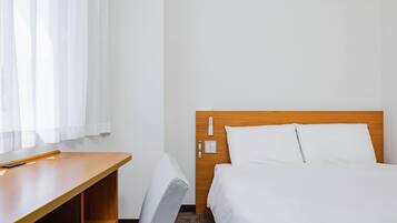 Down duvets, desk, laptop workspace, blackout curtains