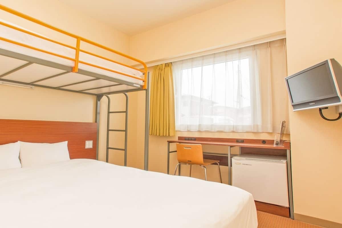 Desk, laptop workspace, blackout curtains, free WiFi