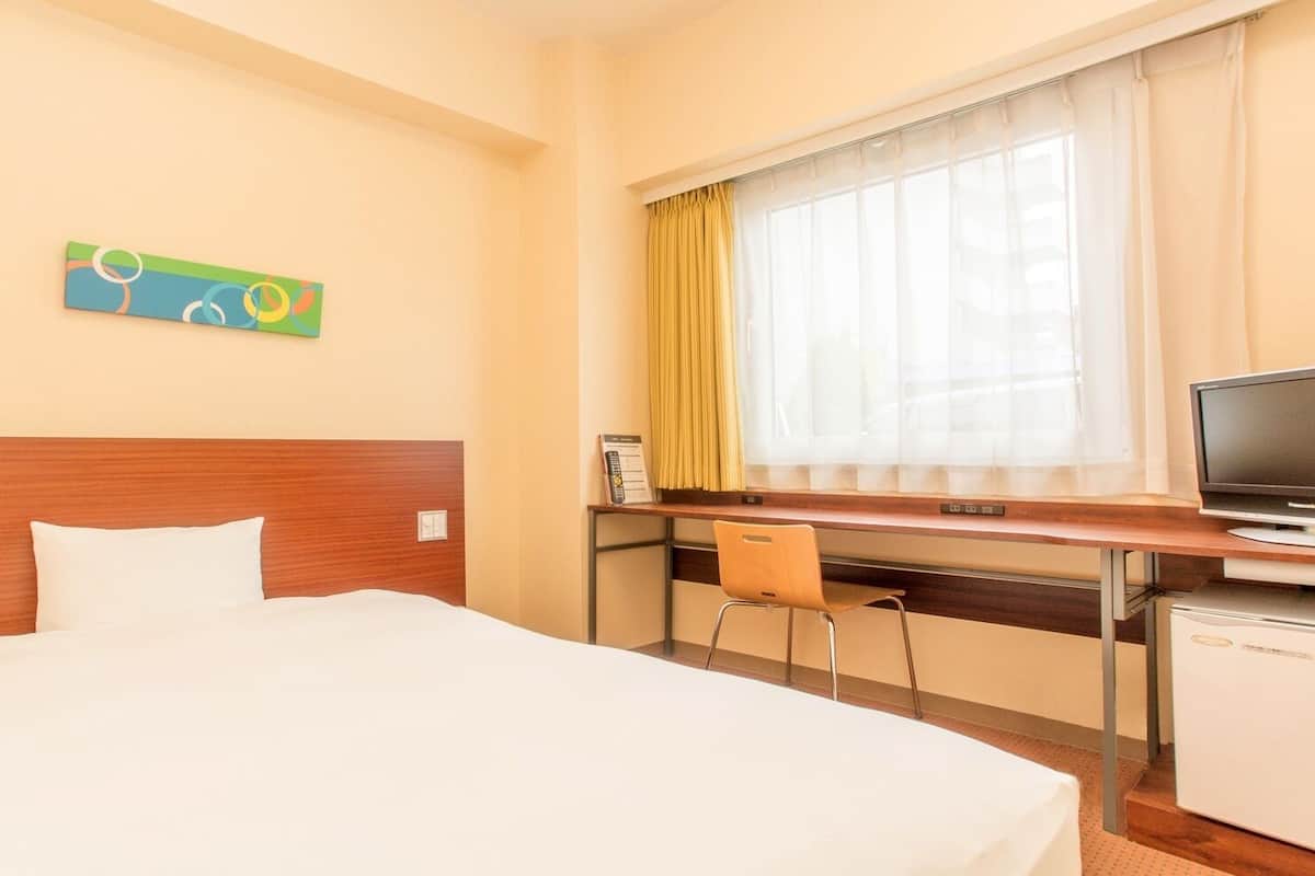 Desk, laptop workspace, blackout curtains, free WiFi