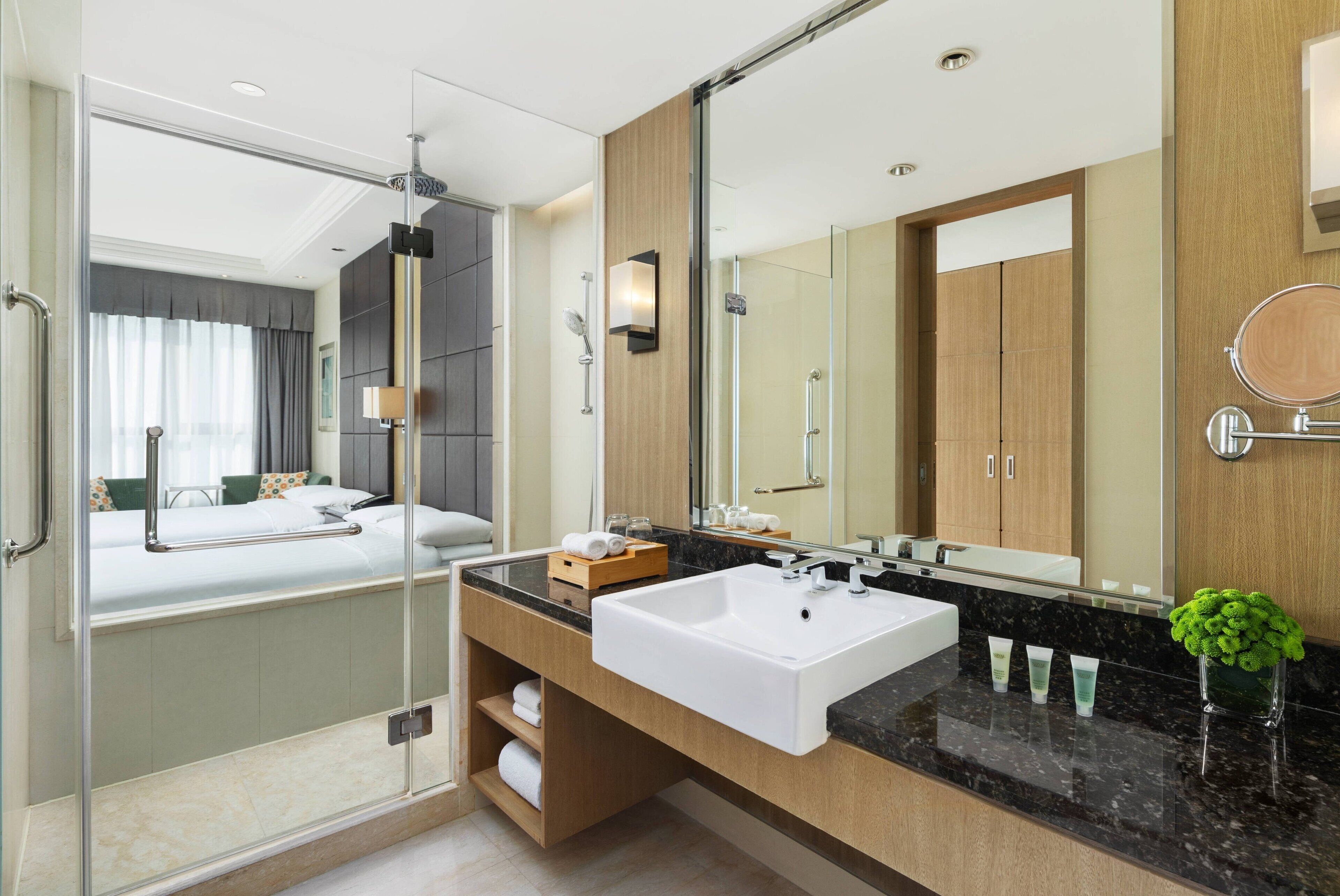 combined shower/bathtub, free toiletries, hair dryer, slippers