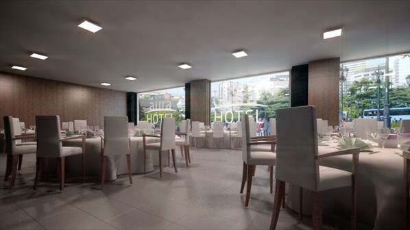 A modern hotel dining area with multiple tables and chairs, large windows offering a city view, and recessed ceiling lighting. - Sercotel Aura Algeciras (Algeciras)