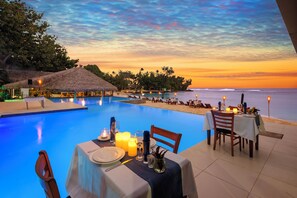 Outdoor pool, pool umbrellas, sun loungers