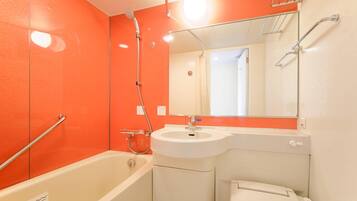 Bañera con ducha, artículos de tocador gratuitos, secador de pelo