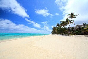 Private beach, white sand, sun-loungers, beach towels