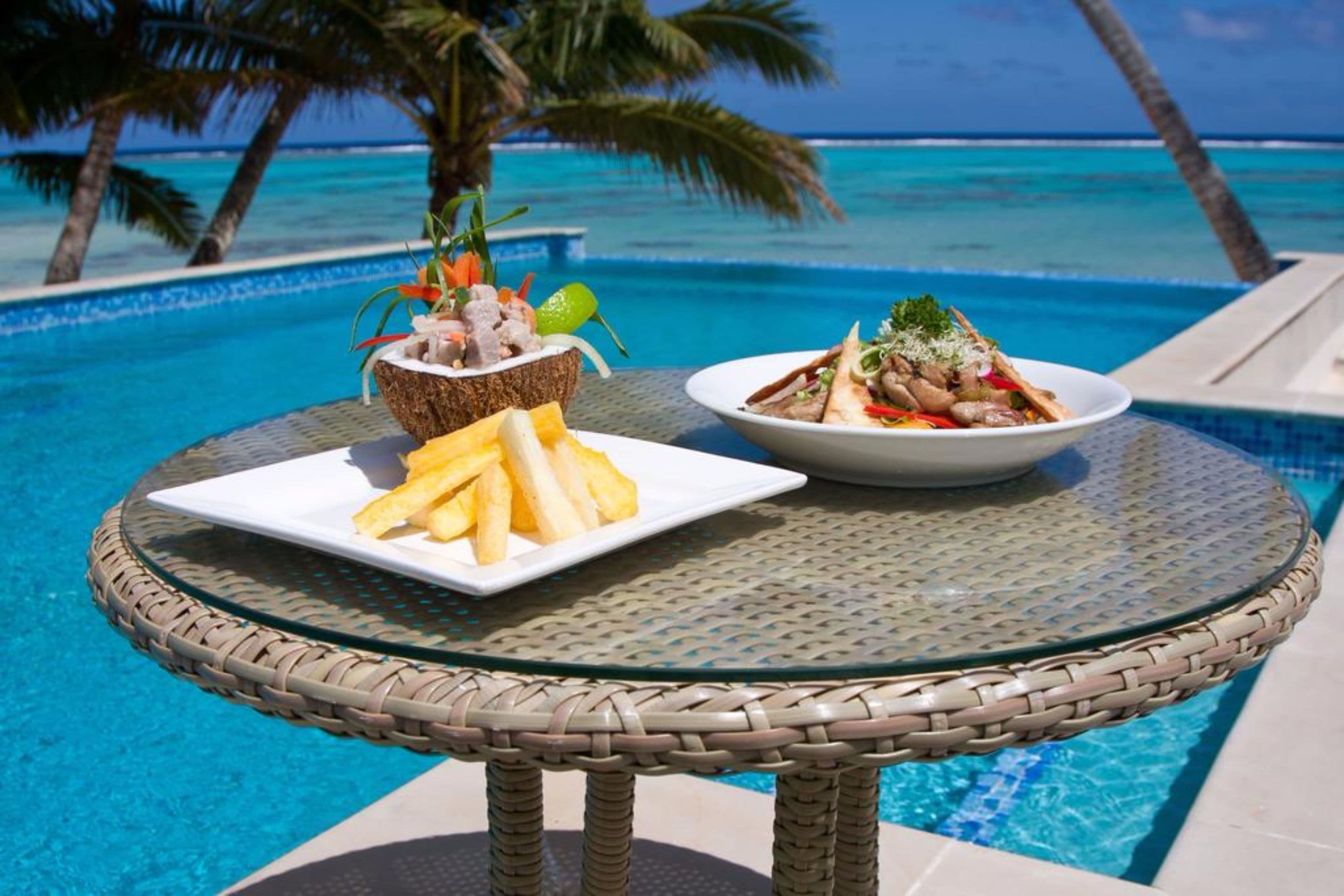 Breakfast, lunch, dinner served; beach views 