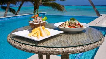 Breakfast, lunch, dinner served; beach views