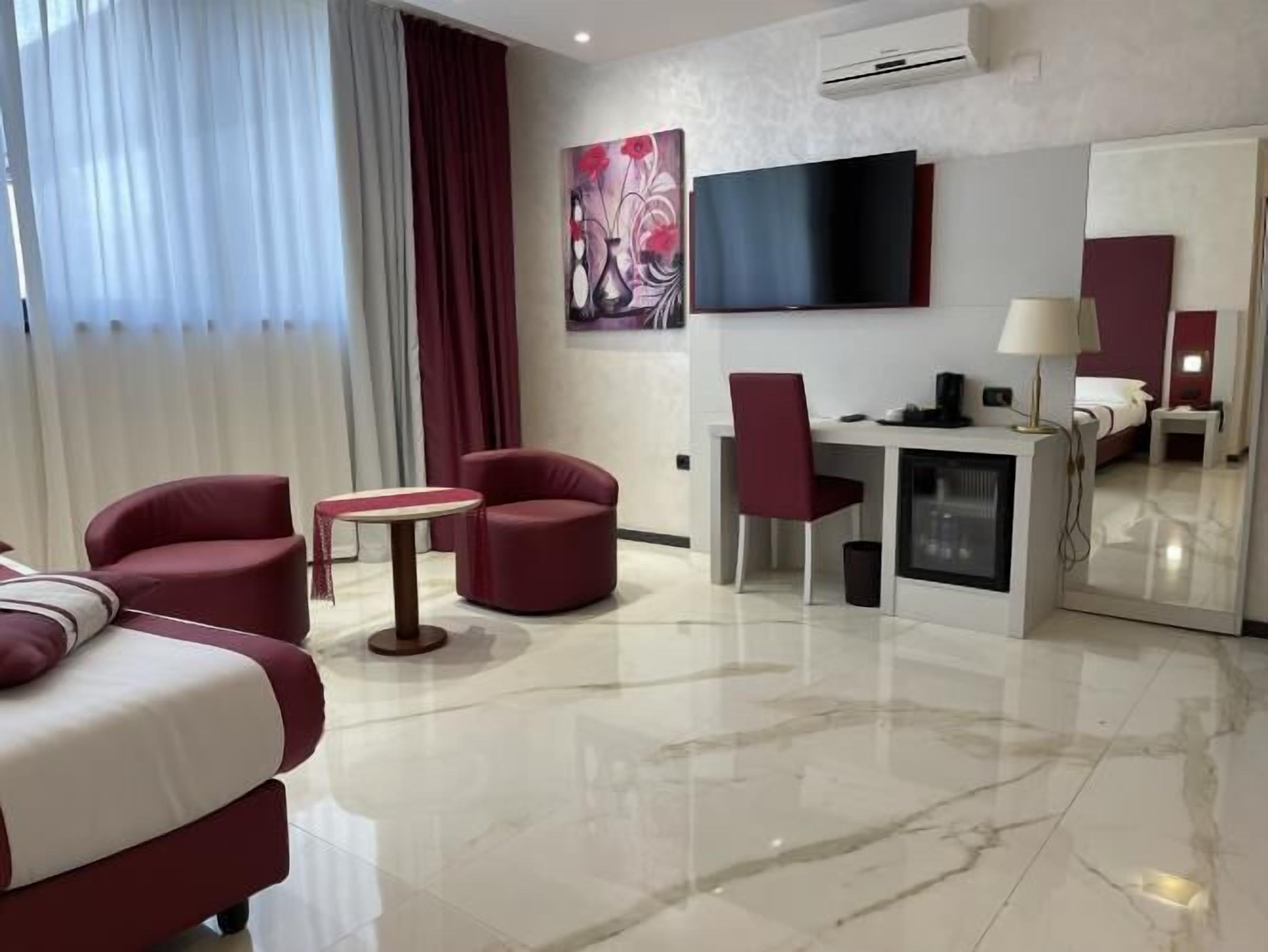 Junior Suite, 1 King Bed | 8 bedrooms, minibar, in-room safe, desk