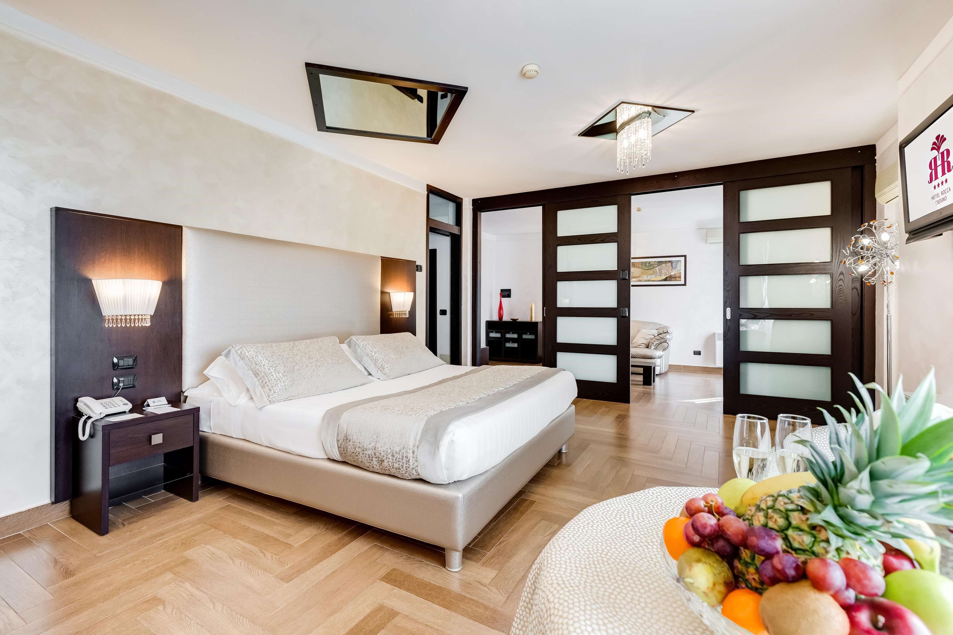 suite, 1 king bed, jetted tub | 8 bedrooms, in-room safe, desk, blackout curtains