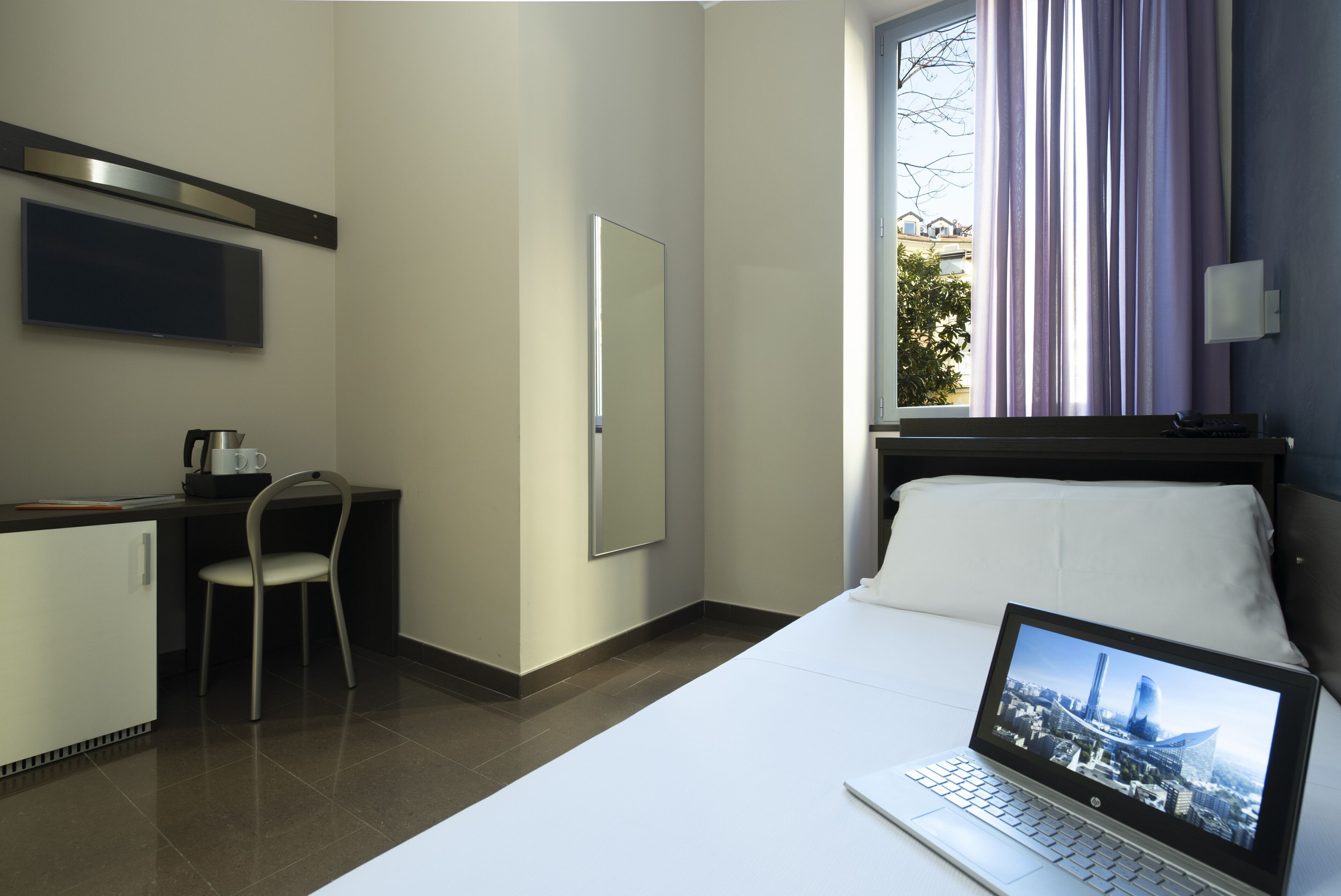 Down comforters, minibar, in-room safe, desk