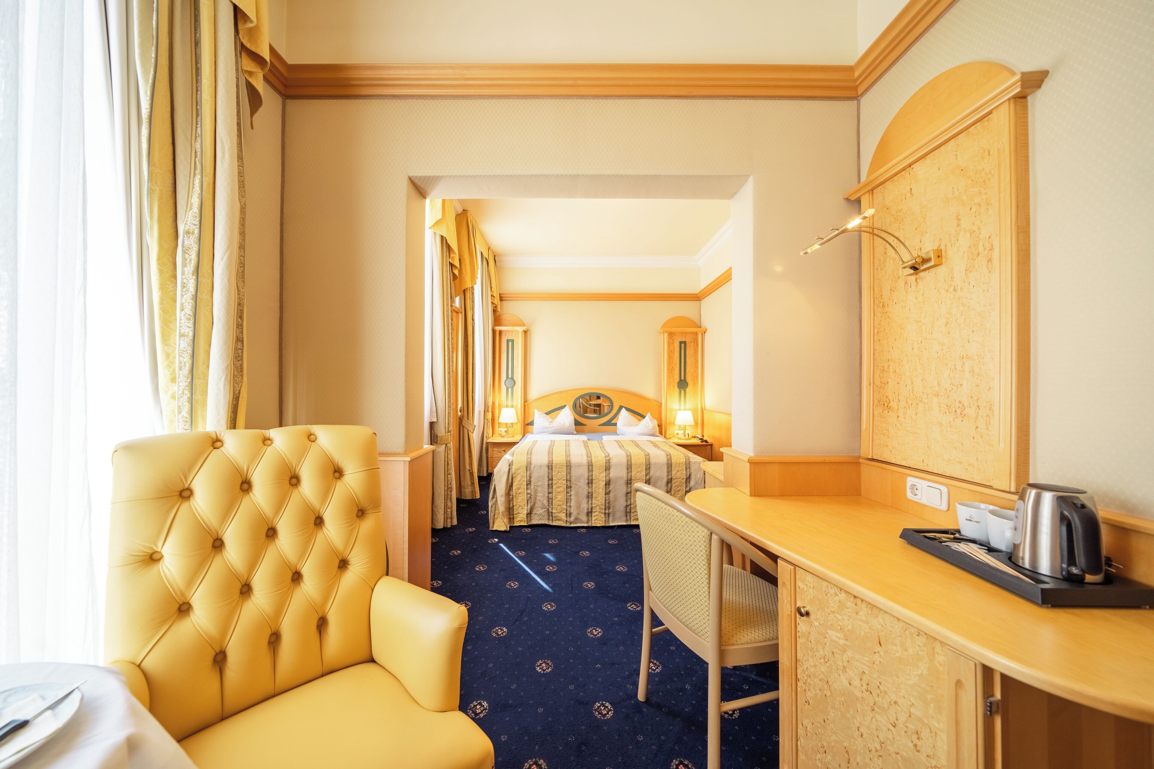 Superior Double Room | Minibar, in-room safe, desk, blackout drapes