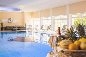 Indoor pool, outdoor pool, pool umbrellas, sun loungers
