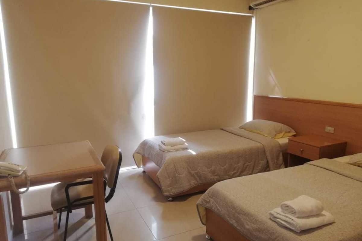 Suite deux chambres Ă coucher avec cuisine Living Room and Private Bathroom