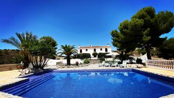 Outdoor pool, pool umbrellas, pool loungers