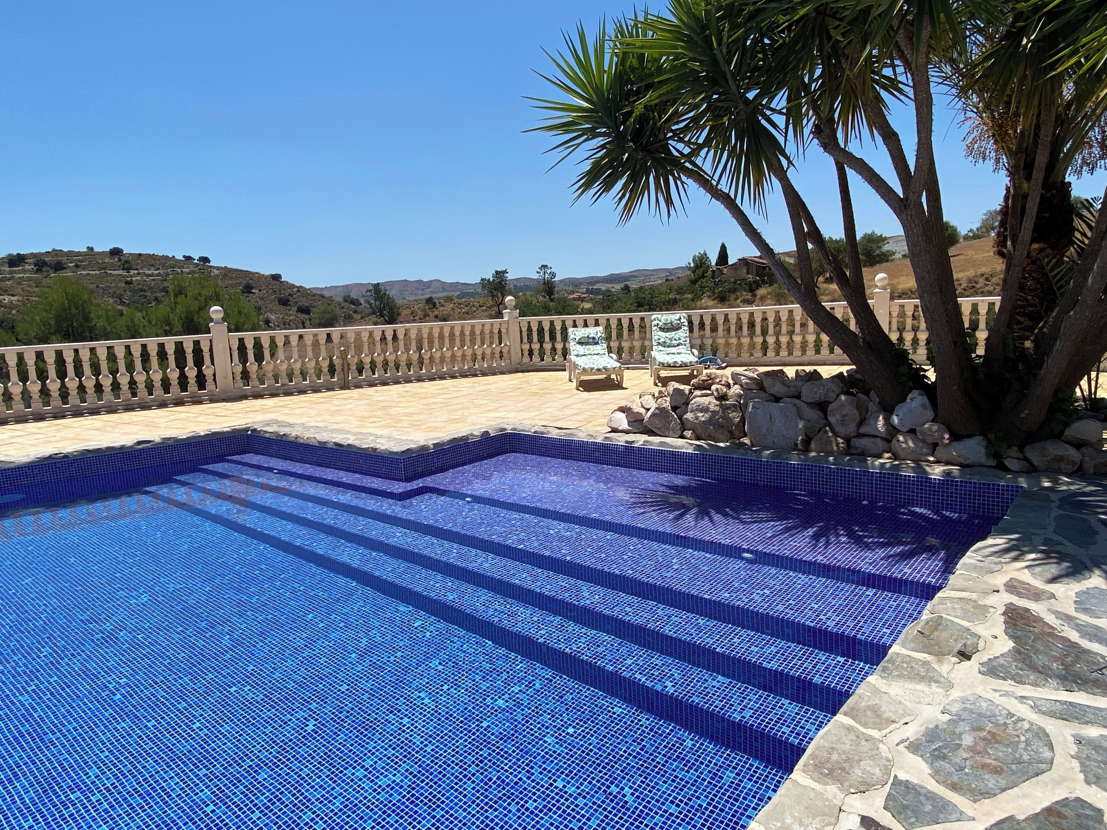 Outdoor pool, pool umbrellas, pool loungers