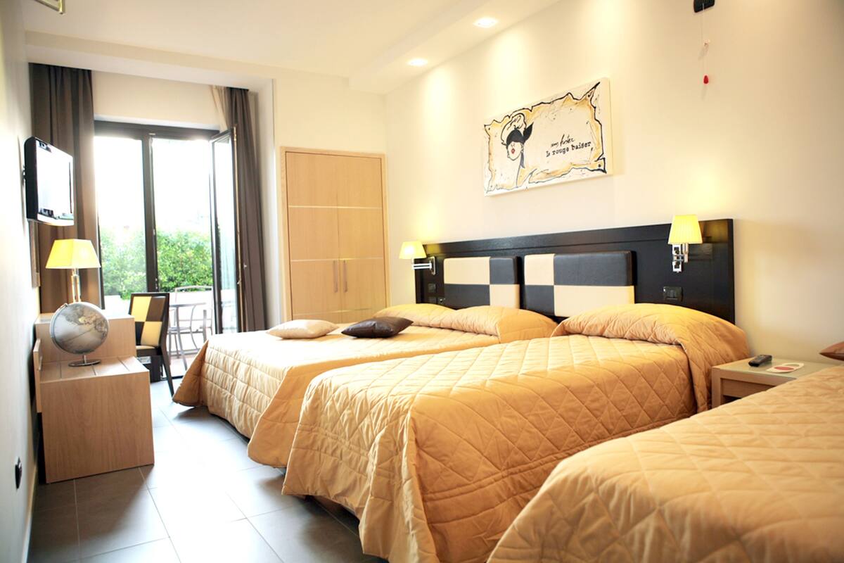 quadruple room | premium bedding, minibar, in-room safe, desk