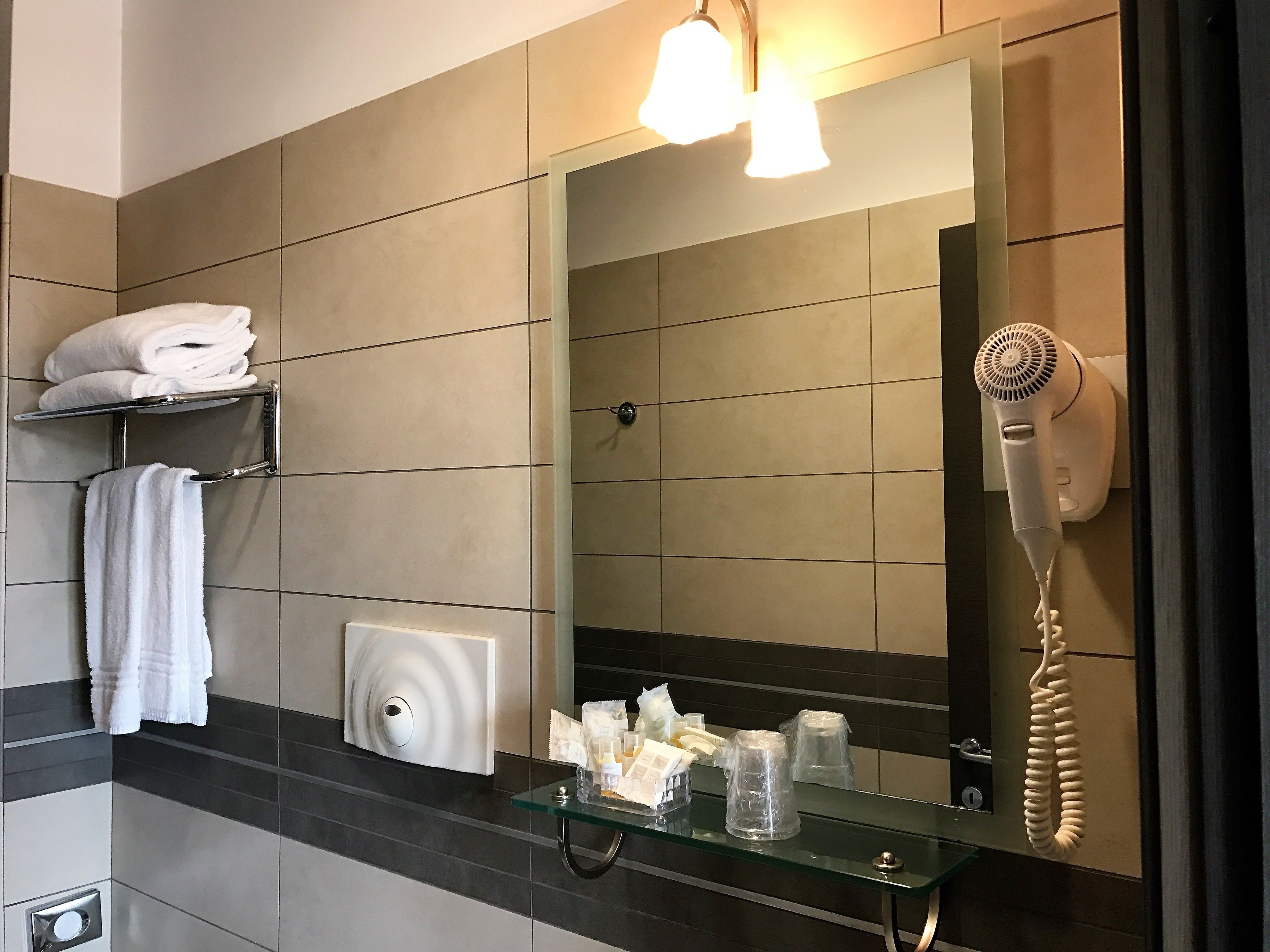 shower, hair dryer, bathrobes, bidet