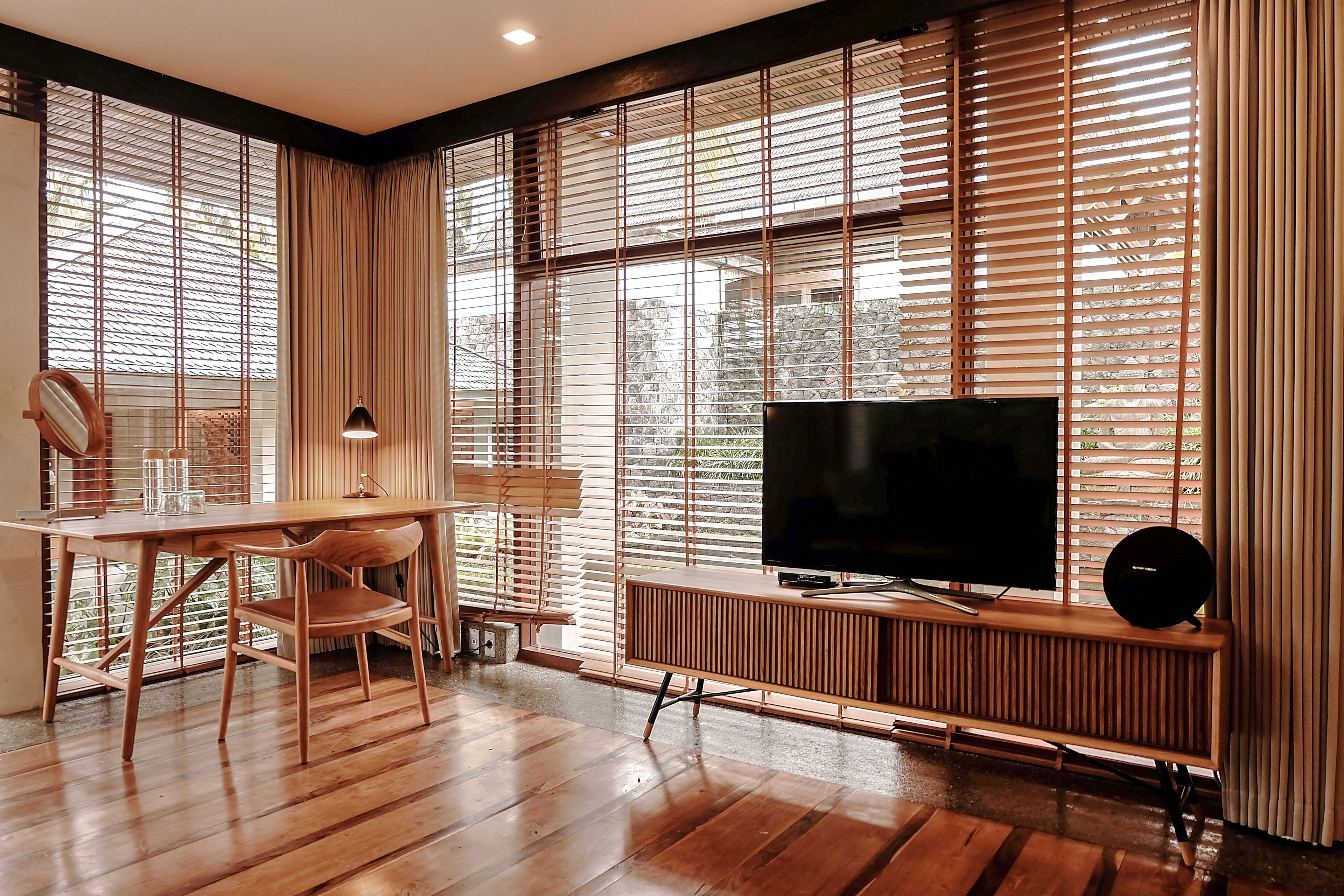 premier villa, 2 bedrooms, private pool, valley view | living area | 43-inch tv with satellite channels, netflix, dvd player