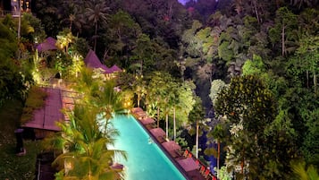 Outdoor pool, open 8:00 AM to 8:00 PM, free cabanas, pool umbrellas