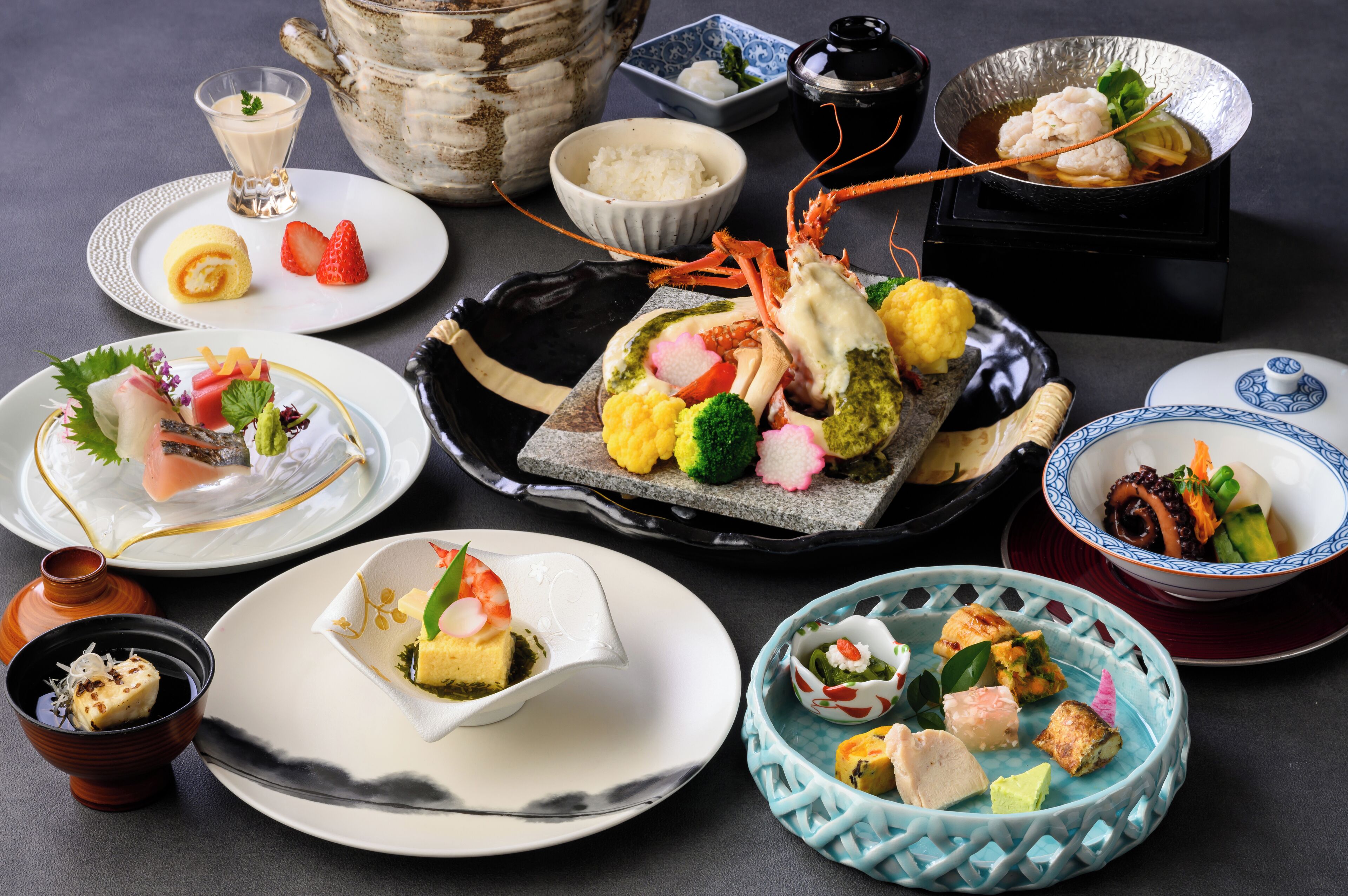 A variety of Japanese dishes arranged on a table.