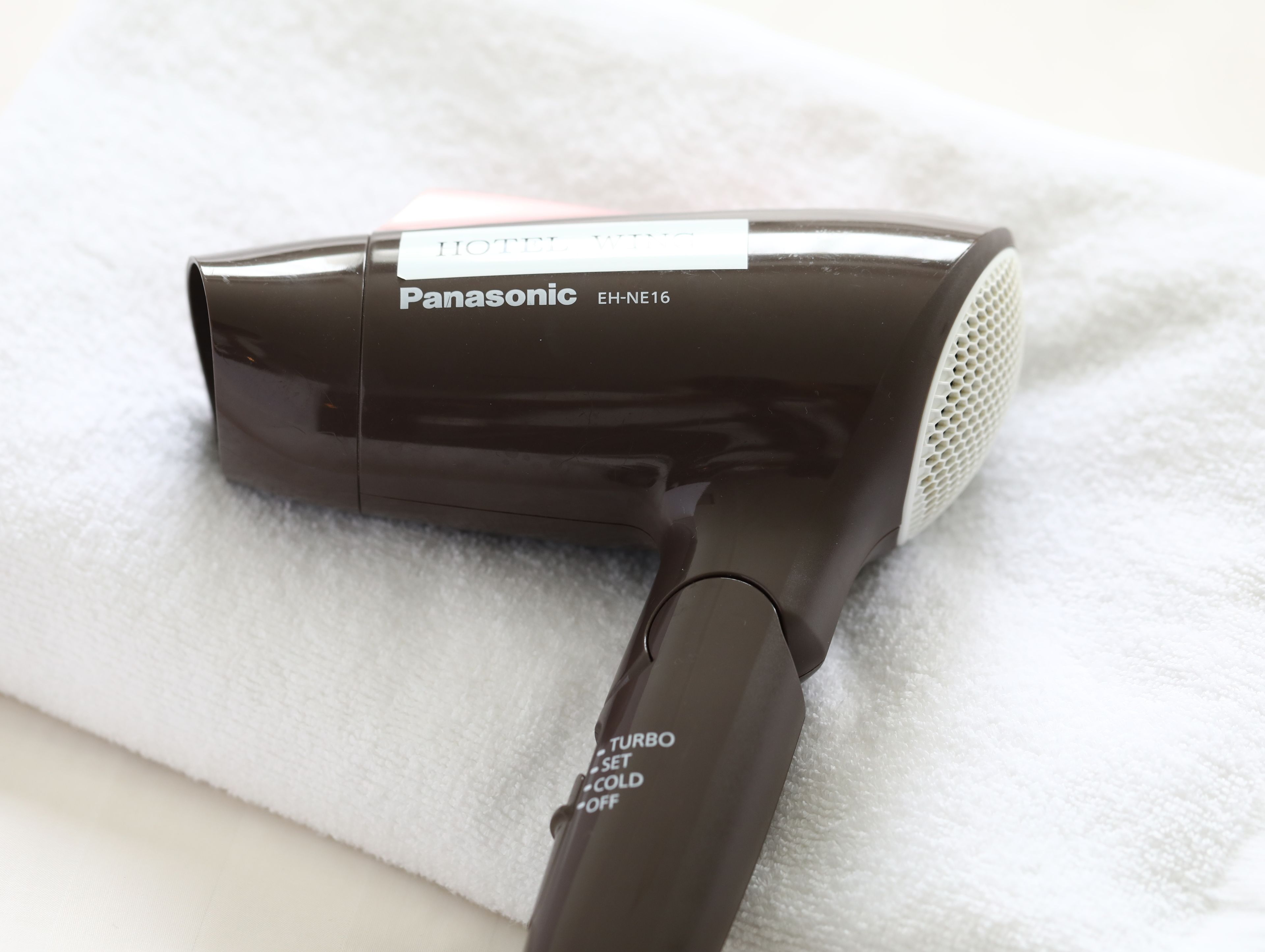 combined shower/bathtub, free toiletries, hair dryer, slippers