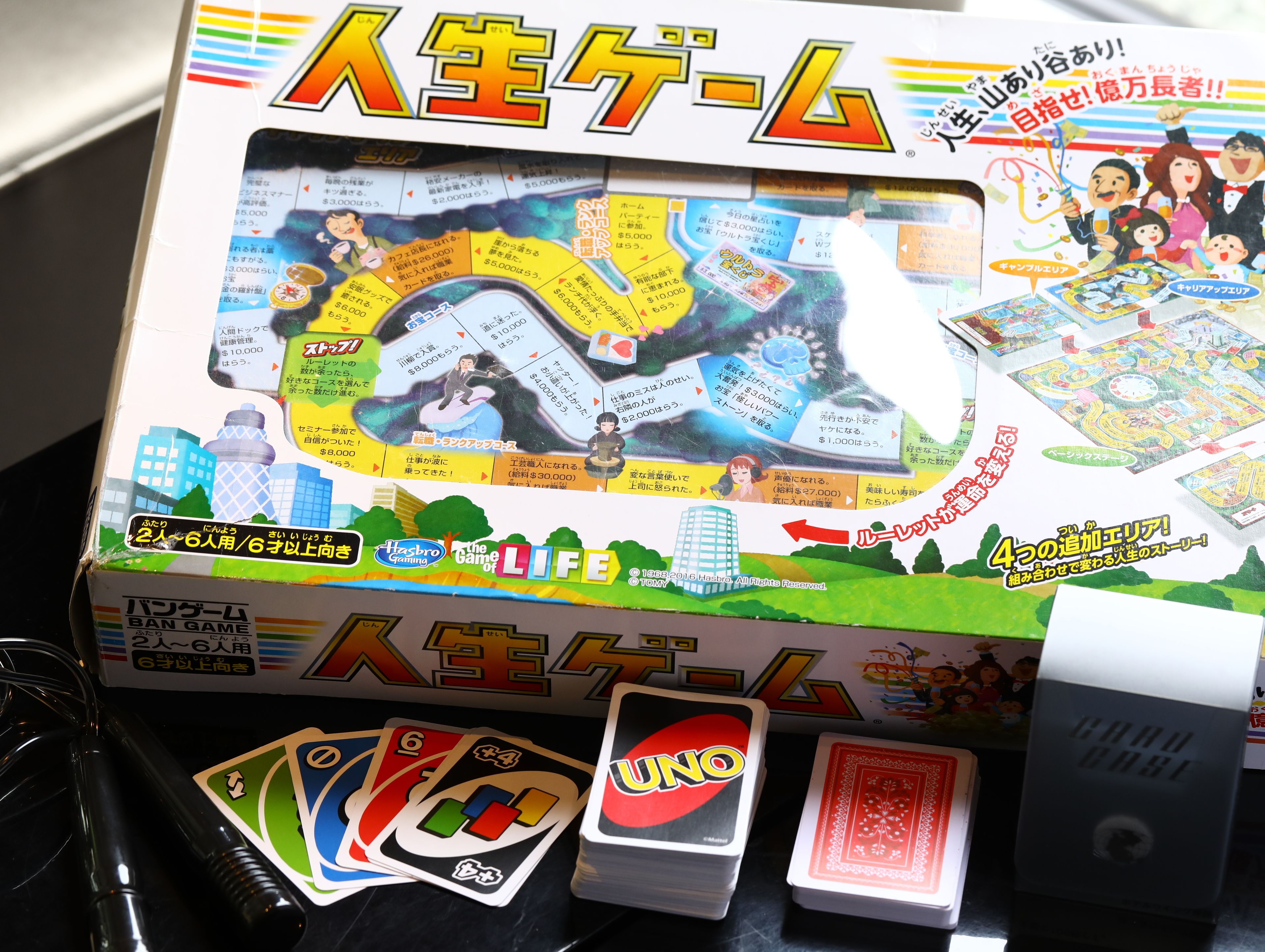 A board game with a colorful game board and cards.