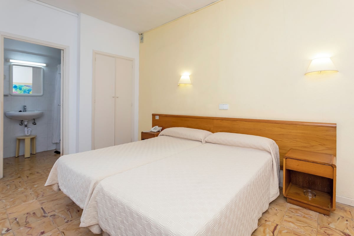Desk, blackout curtains, iron/ironing board (on request), free WiFi