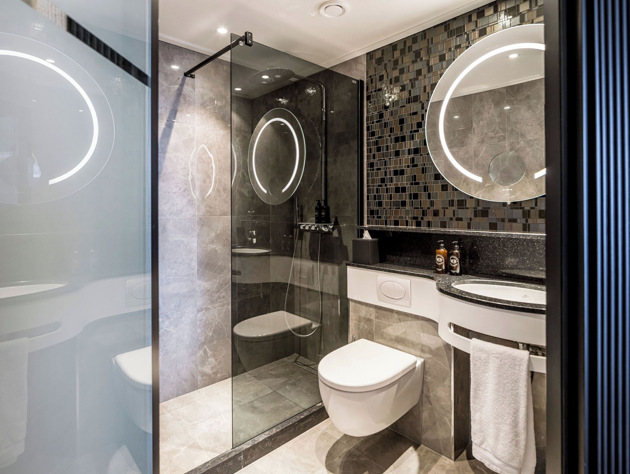 rainfall showerhead, hair dryer, towels, soap