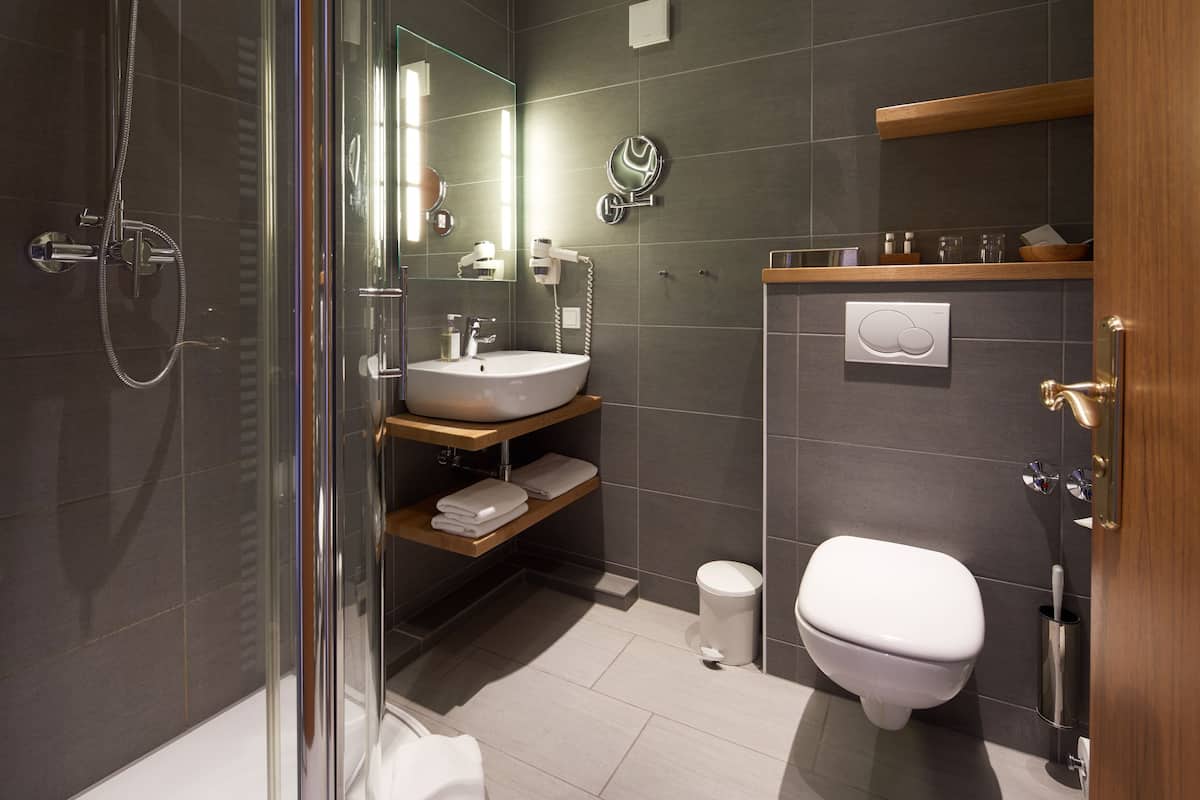traditional double room | bathroom | hair dryer, bathrobes, slippers, towels