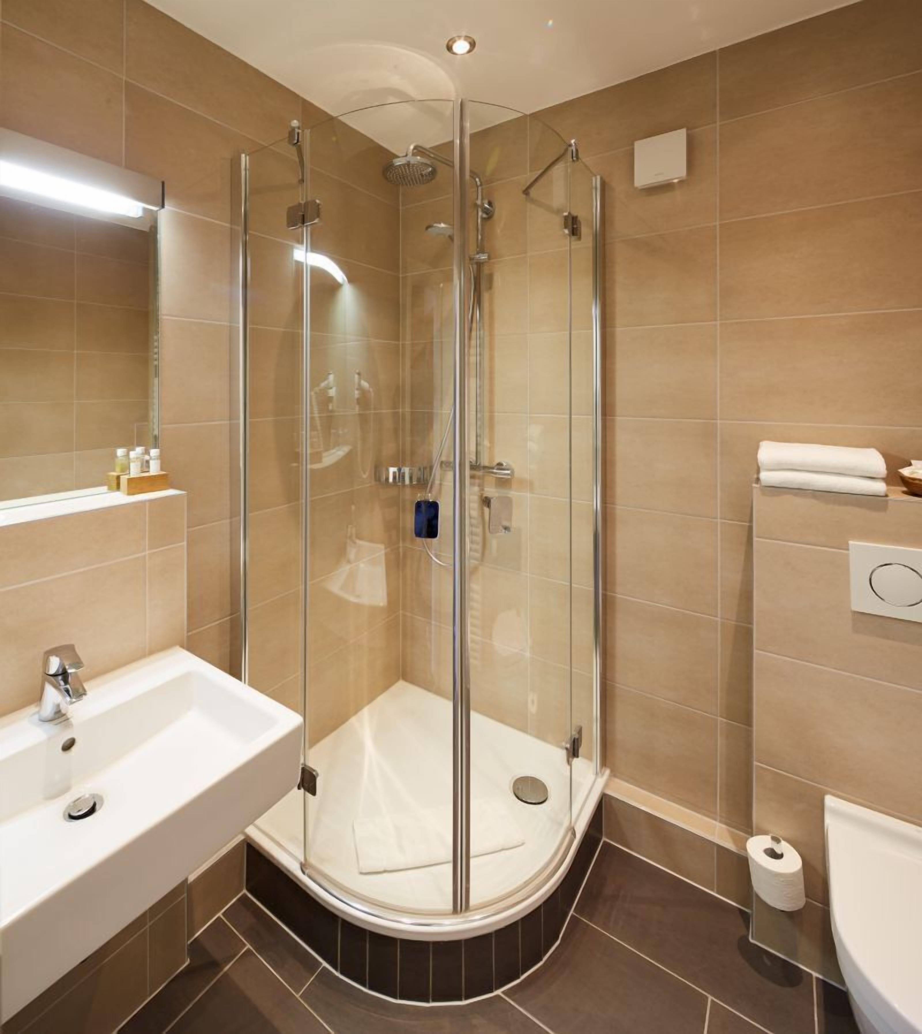 comfort double room | bathroom | hair dryer, bathrobes, slippers, towels