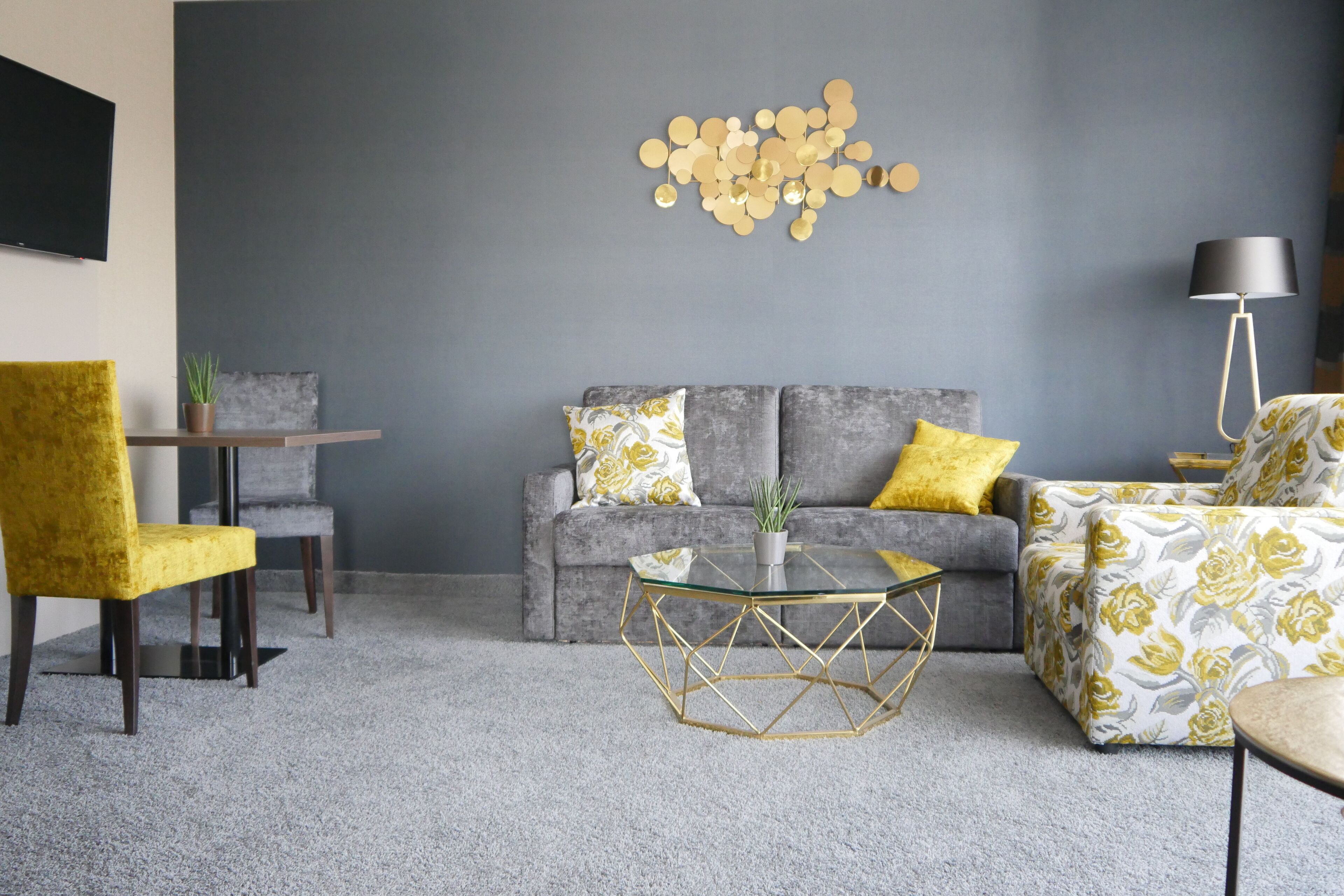 superior suite | living area | flat-screen tv