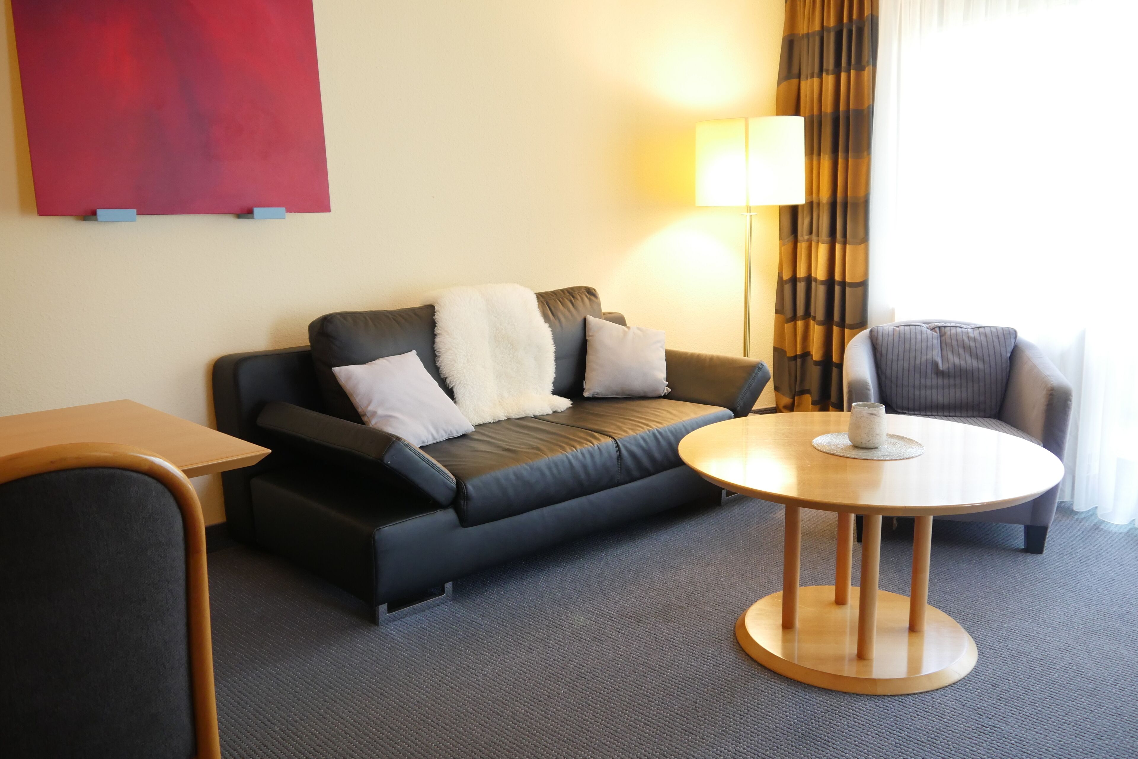 suite | living area | flat-screen tv