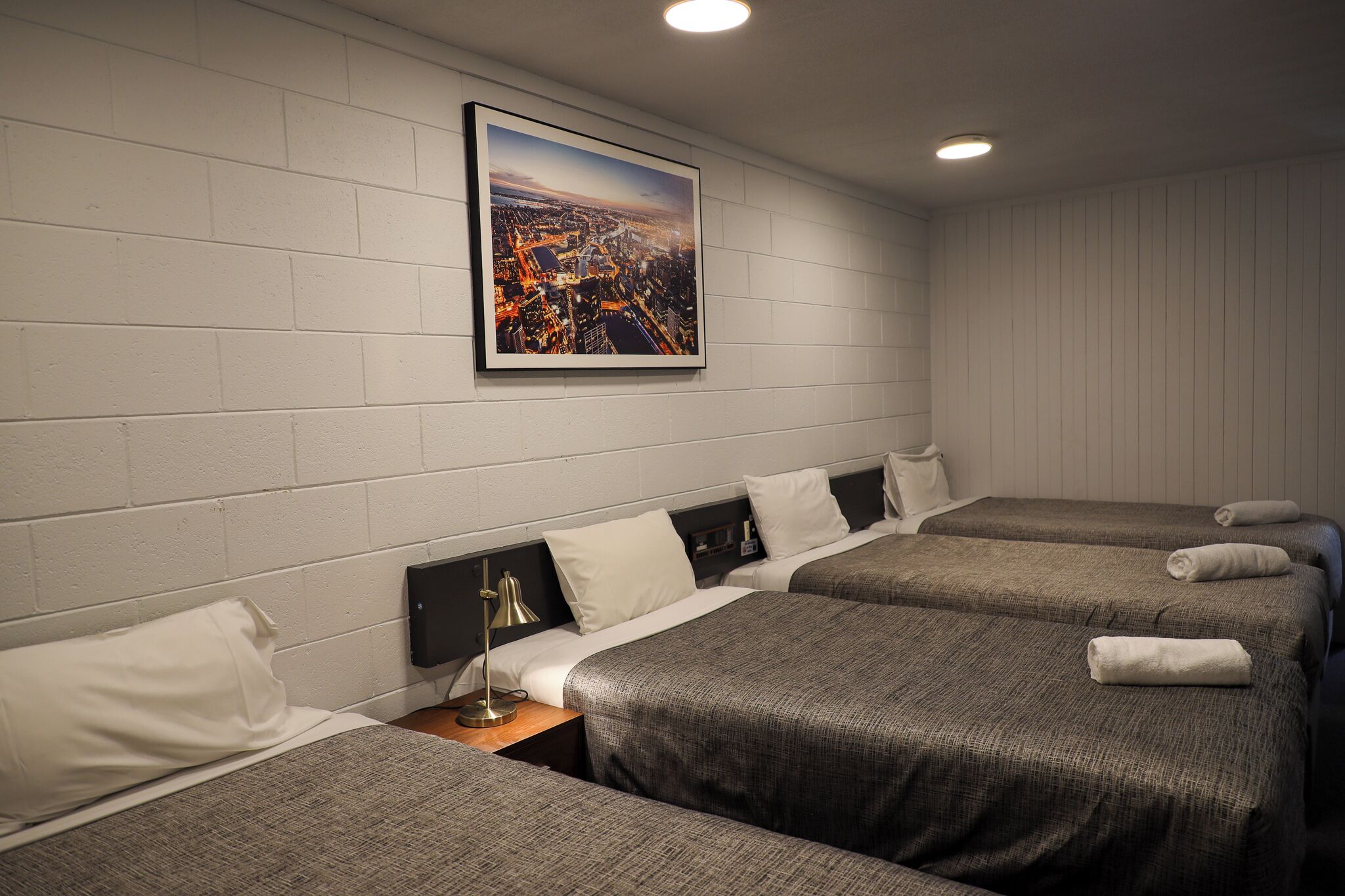 Family Room, Multiple Beds | Premium bedding, individually furnished, desk, bed sheets